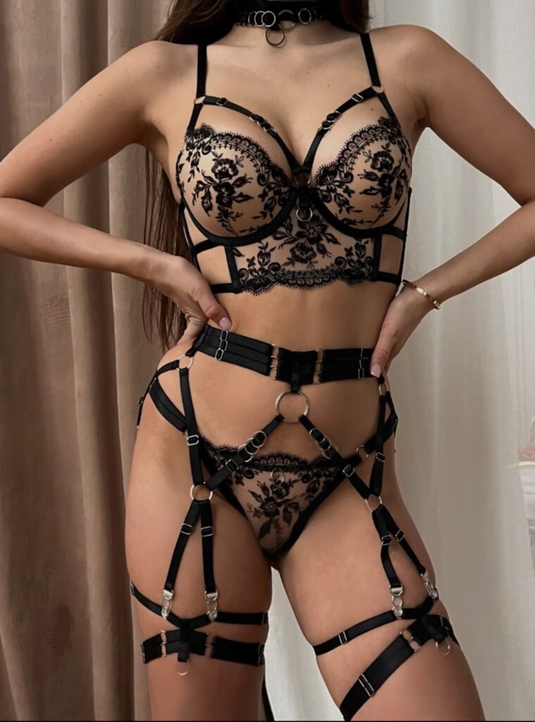 Red and neon peach 4-piece lingerie set with bra, panties, garter belt, and choker from Drapery Boutique Dubai